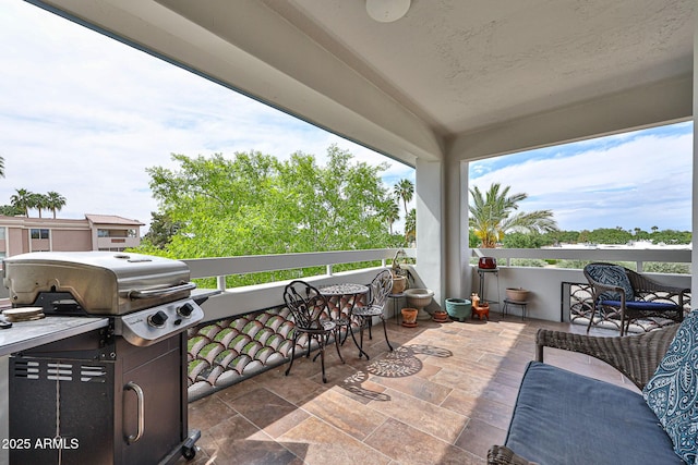 17404 N 99th Ave Unit 318, Sun City, AZ 85373 - view of patio / terrace featuring a balcony and grilling area