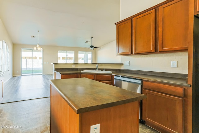 kitchen featuring light hardwood / wood-style floors, a center island, a healthy amount of sunlight, and sink