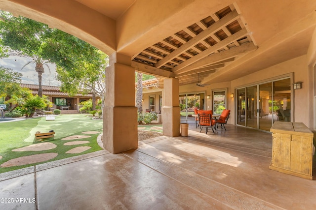 view of patio with ceiling fan