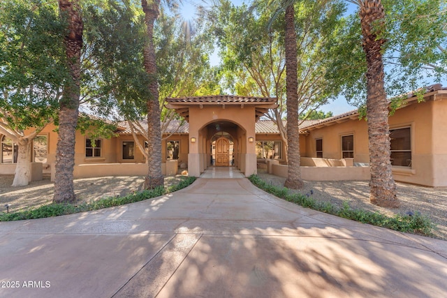 view of mediterranean / spanish house