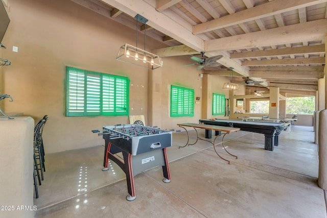 playroom featuring vaulted ceiling with beams and ceiling fan