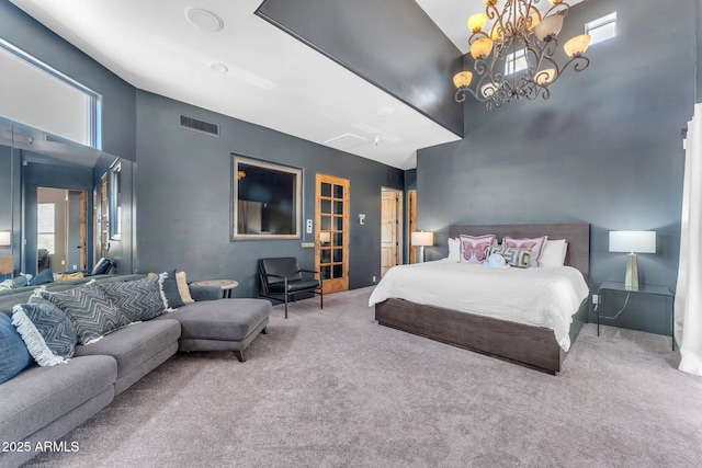 carpeted bedroom with an inviting chandelier and a towering ceiling