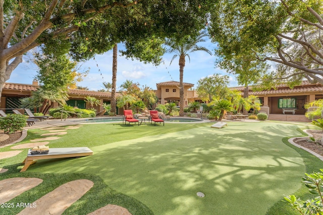 view of property's community with a pool