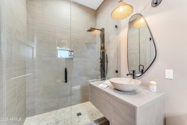 bathroom with sink and walk in shower