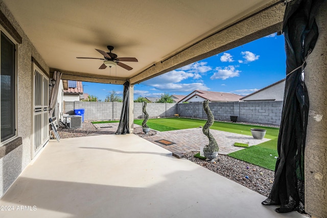 view of patio / terrace featuring ceiling fan and central AC unit