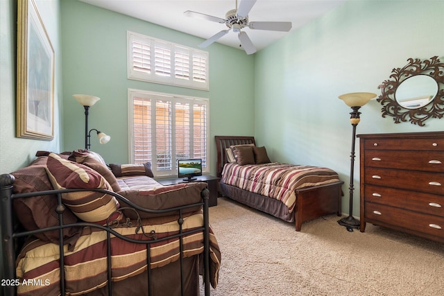 bedroom with carpet flooring and a ceiling fan