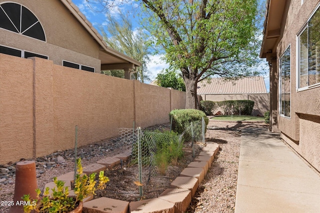 view of yard featuring a fenced backyard