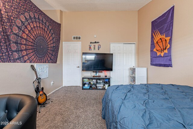 7764 N 19th Dr, Phoenix, AZ 85021 - carpeted bedroom with a textured ceiling