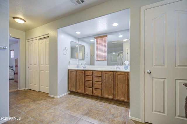 1786 S Seton Ave, Gilbert, AZ 85295 - full bath featuring baseboards, double vanity, tile patterned flooring, a shower with shower curtain, and recessed lighting