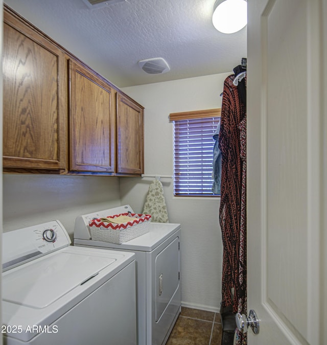 1786 S Seton Ave, Gilbert, AZ 85295 - laundry room featuring washer and dryer, cabinet space, a textured ceiling, and dark tile patterned flooring