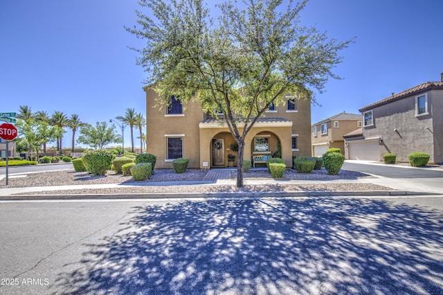 1786 S Seton Ave, Gilbert, AZ 85295 - mediterranean / spanish house with stucco siding and driveway