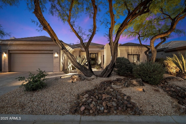 33667 N 71st Way, Scottsdale, AZ 85266 - view of front of home with an attached garage, concrete driveway, and stucco siding