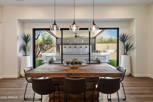 33667 N 71st Way, Scottsdale, AZ 85266 - dining space with baseboards, a ceiling fan, and wood finished floors