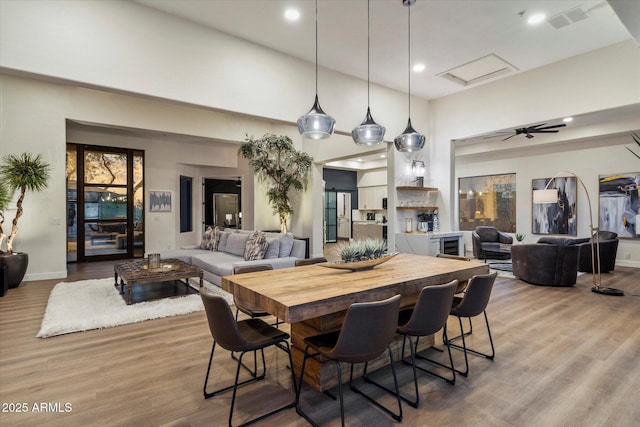 33667 N 71st Way, Scottsdale, AZ 85266 - dining space with wood finished floors, recessed lighting, and baseboards