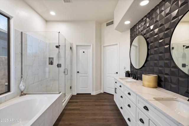 33667 N 71st Way, Scottsdale, AZ 85266 - full bathroom with a stall shower, a bath, double vanity, wood finished floors, and recessed lighting