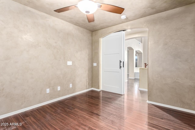 unfurnished room with ceiling fan