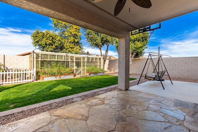 view of patio with ceiling fan