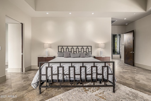 bedroom with baseboards and recessed lighting