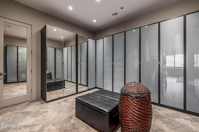 walk in closet featuring visible vents
