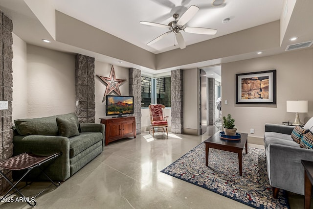 living area with recessed lighting, visible vents, and a ceiling fan
