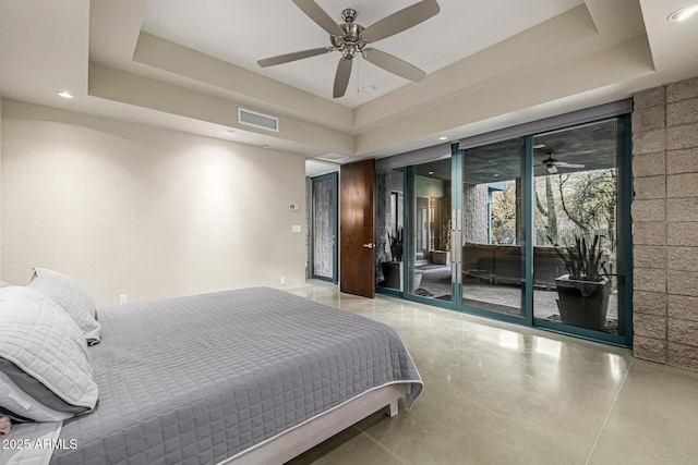 bedroom featuring recessed lighting, a raised ceiling, visible vents, and access to outside