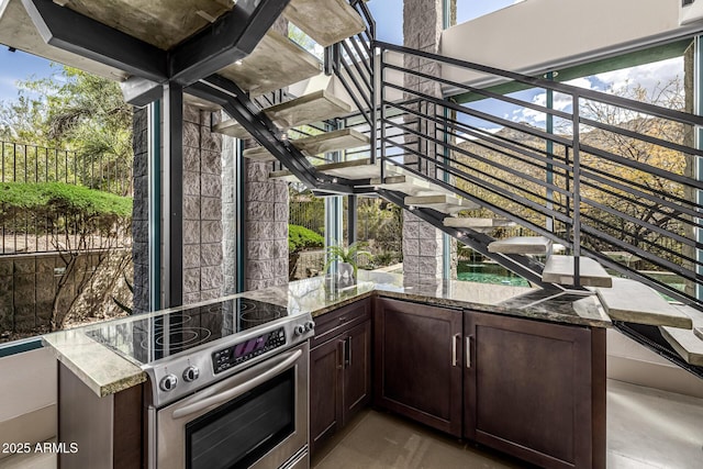view of patio featuring stairs and area for grilling