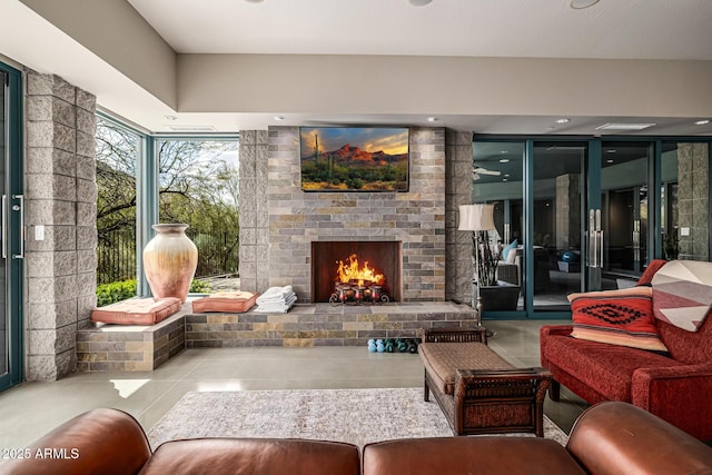 interior space featuring a brick fireplace and tile patterned floors