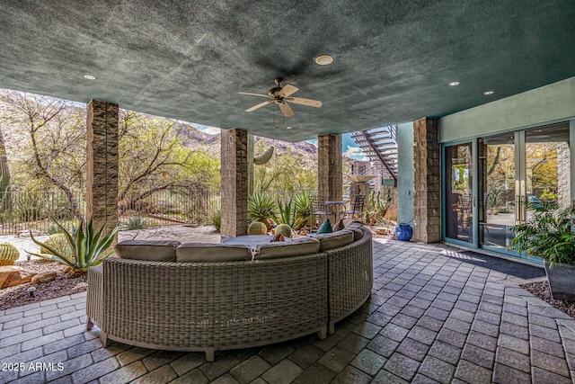 view of patio / terrace featuring an outdoor hangout area and a ceiling fan