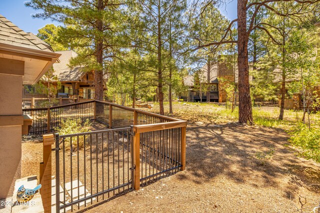 1697 E Solitude Ct Unit 22, Flagstaff, AZ 86005 - view of yard with a gate