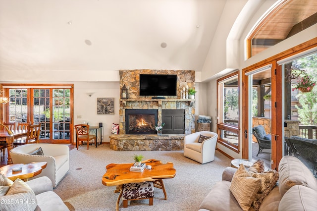 1697 E Solitude Ct Unit 22, Flagstaff, AZ 86005 - carpeted living area featuring a fireplace and vaulted ceiling