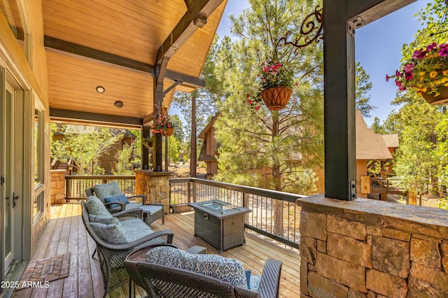 1697 E Solitude Ct Unit 22, Flagstaff, AZ 86005 - wooden deck with an outdoor living space