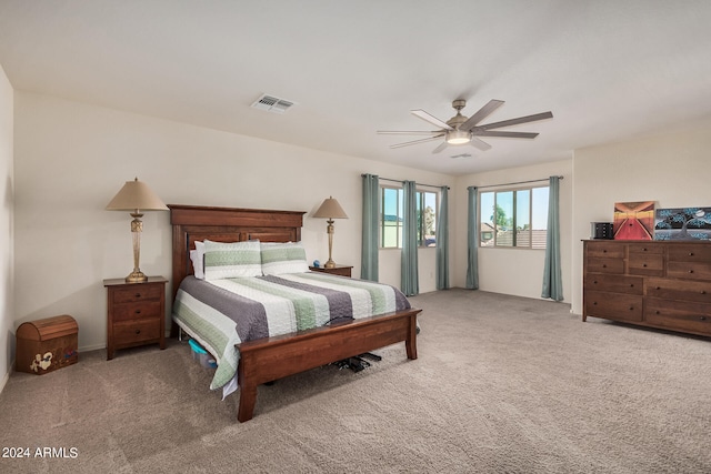 carpeted bedroom featuring ceiling fan