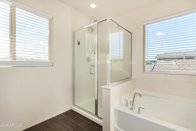 bathroom with independent shower and bath