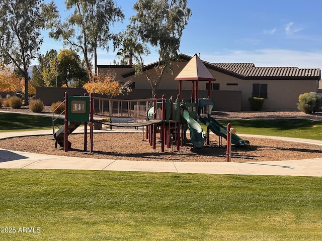 view of play area with a yard