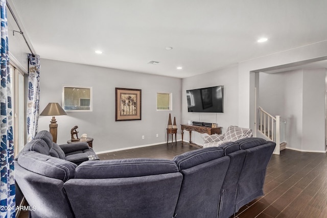 living room featuring dark hardwood / wood-style flooring