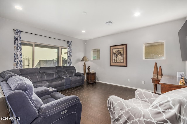 living room with dark hardwood / wood-style floors