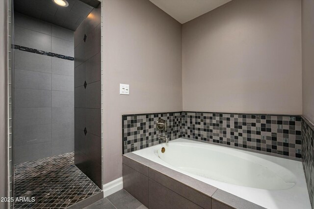 bathroom featuring a garden tub, a tile shower, recessed lighting, tile patterned flooring, and baseboards