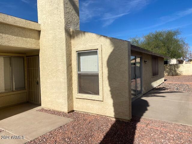 view of home's exterior featuring a patio