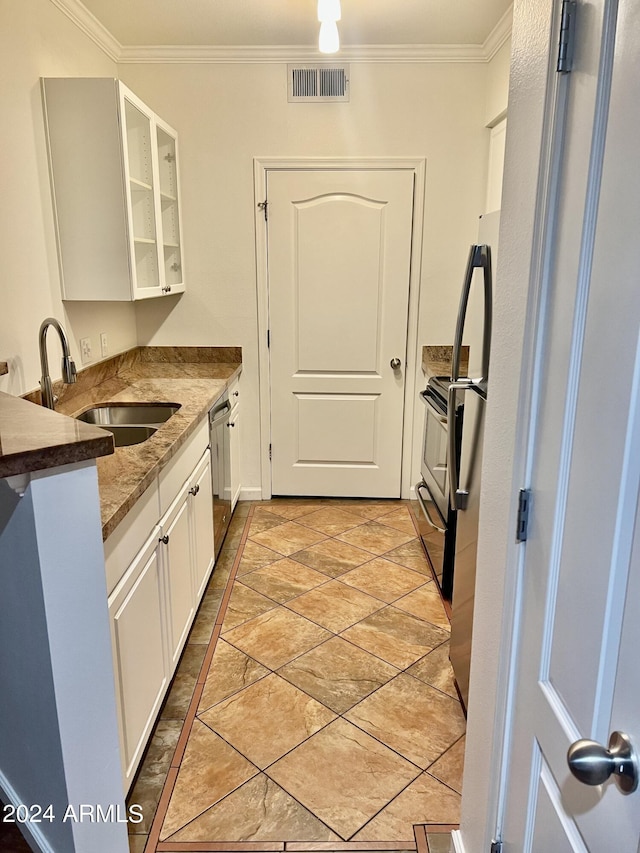 kitchen featuring stone counters, dishwasher, white cabinetry, sink, and crown molding