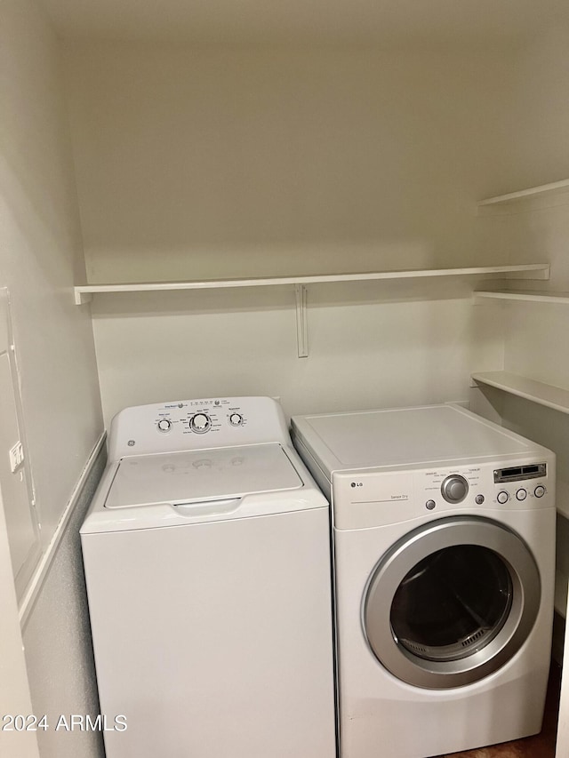 washroom with washer and clothes dryer