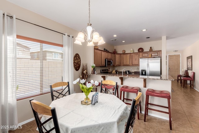 dining room with visible vents, light tile patterned floors, baseboards, a notable chandelier, and recessed lighting