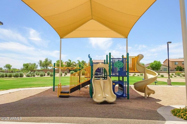 community play area with a yard