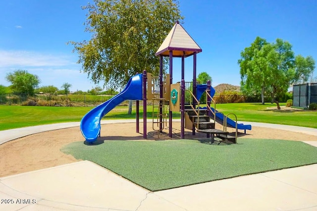 community playground with fence and a yard