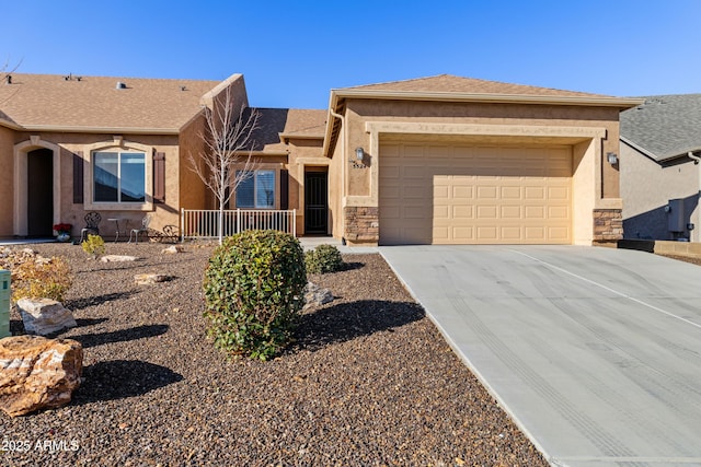 5524 N Brinson Ln, Prescott Valley, AZ 86314 - ranch-style home with driveway, a garage, stucco siding, and stone siding