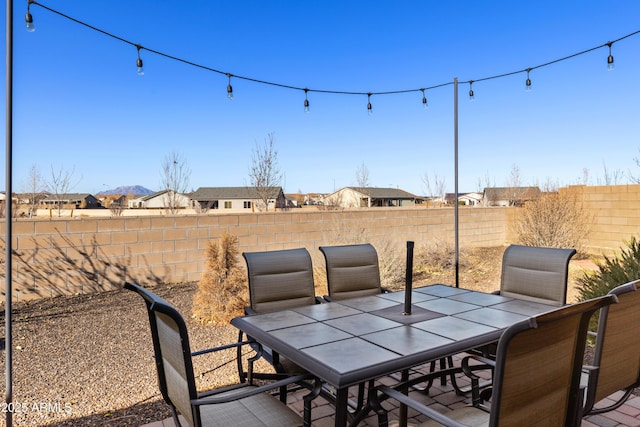 5524 N Brinson Ln, Prescott Valley, AZ 86314 - view of patio with outdoor dining area, a fenced backyard, and a residential view