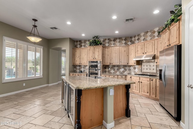 3531 E Norwood Cir, Mesa, AZ 85213 - kitchen featuring appliances with stainless steel finishes, stone tile floors, under cabinet range hood, recessed lighting, and decorative backsplash