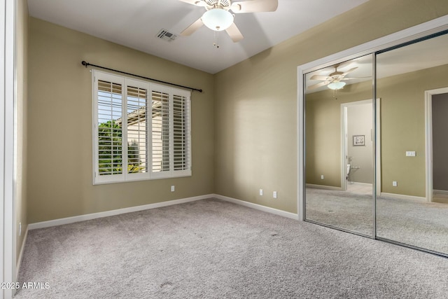 3531 E Norwood Cir, Mesa, AZ 85213 - unfurnished bedroom featuring carpet flooring, a closet, and ceiling fan