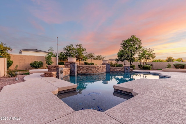 3531 E Norwood Cir, Mesa, AZ 85213 - pool at dusk with a fenced backyard and a patio