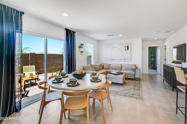 dining area featuring light tile patterned flooring, visible vents, and recessed lighting