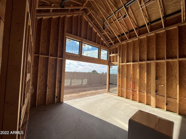 interior space with a towering ceiling